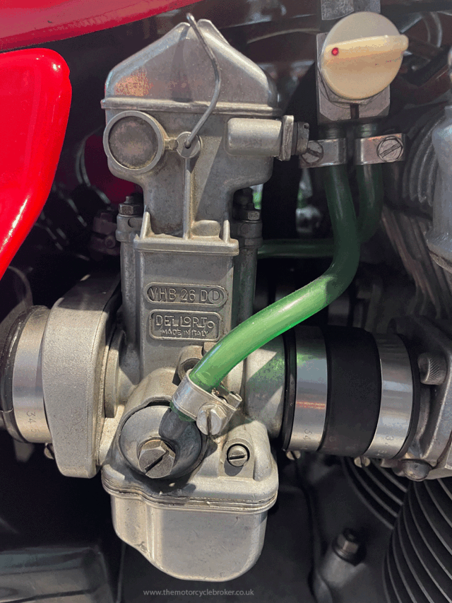 1976 MV Agusta 750 America Carbs and fuel lines close up
