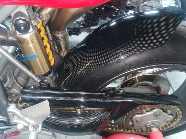 Carbon swing arm cover restored