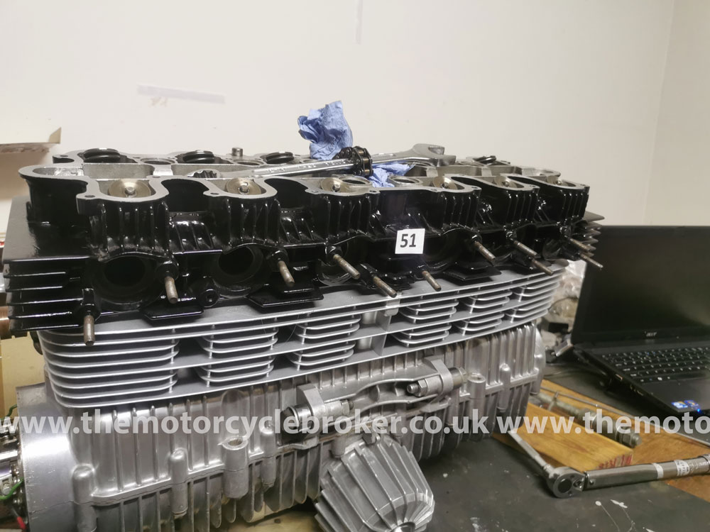 Benelli Sei 750 cylinder head is re-fitted.
